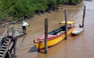 Colorful_boat_at_ferry_dock.JPG (110710 bytes)